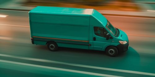 blurry-headlights-busy-highway-carrying-cargo-generated-by-ai